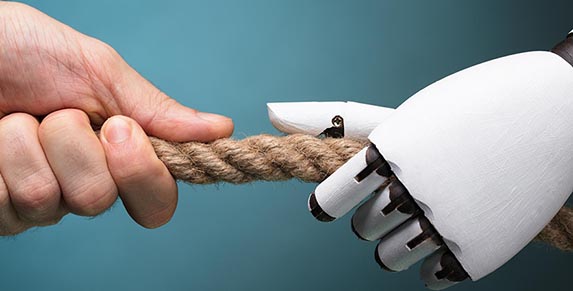 Businessperson And Robot Playing Tug Of War
